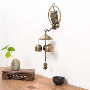 Decorative brass owl hanging doorbell